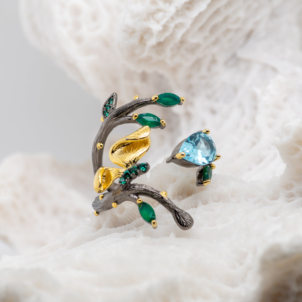 Monarch Sky Blue Topaz Ring in Sterling Silver - Heron and Swan