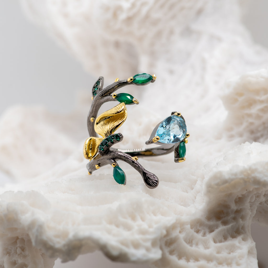 Monarch Sky Blue Topaz Ring in Sterling Silver - Heron and Swan