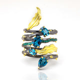 Daffodil London Blue Topaz Ring in Sterling Silver - Heron and Swan