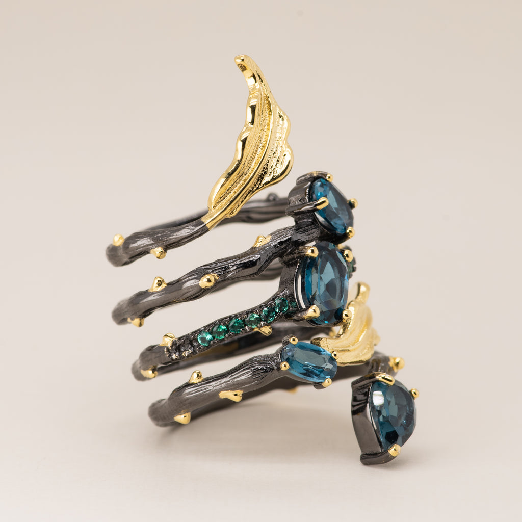 Daffodil London Blue Topaz Ring in Sterling Silver - Heron and Swan
