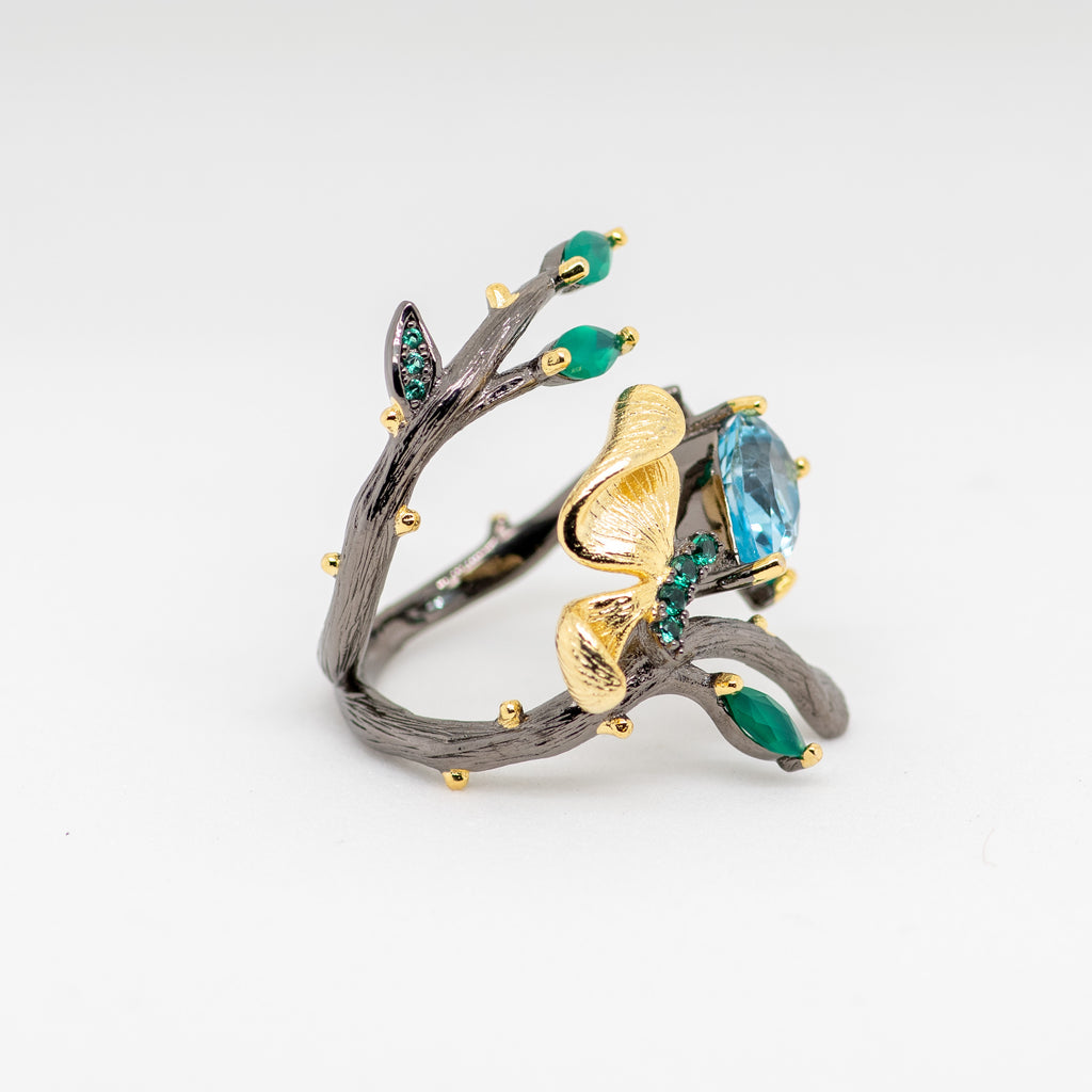 Monarch Sky Blue Topaz Ring in Sterling Silver - Heron and Swan