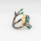 Monarch Sky Blue Topaz Ring in Sterling Silver - Heron and Swan