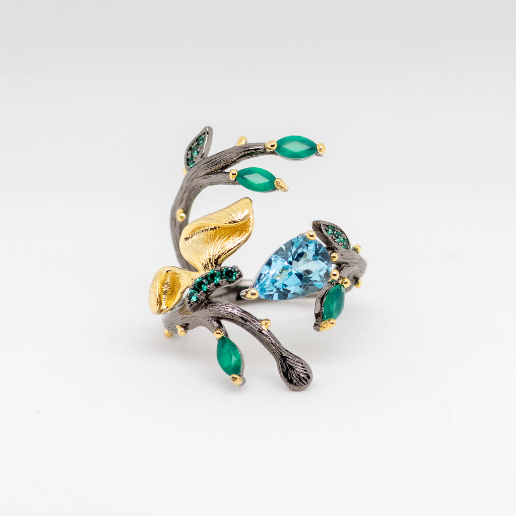 Monarch Sky Blue Topaz Ring in Sterling Silver - Heron and Swan