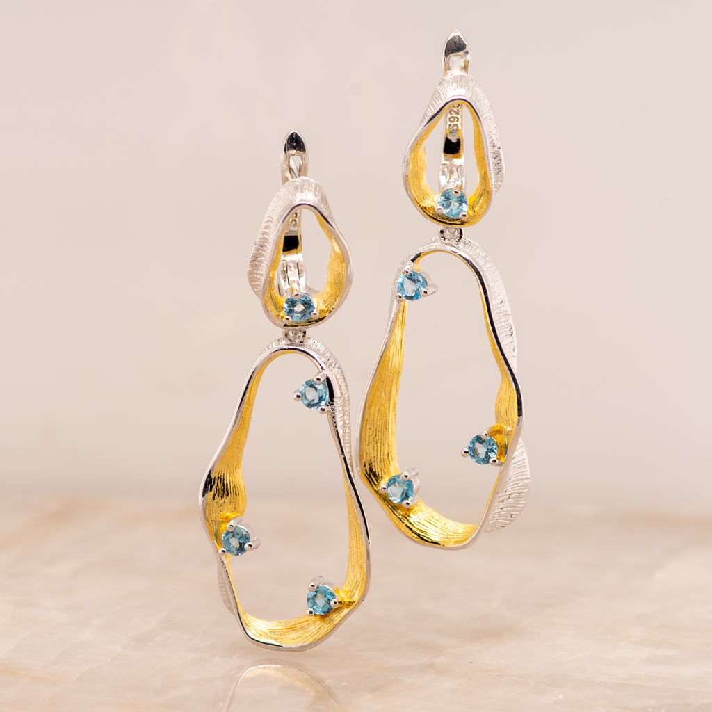 Swirl Blue Topaz Earrings in Sterling Silver - Heron and Swan