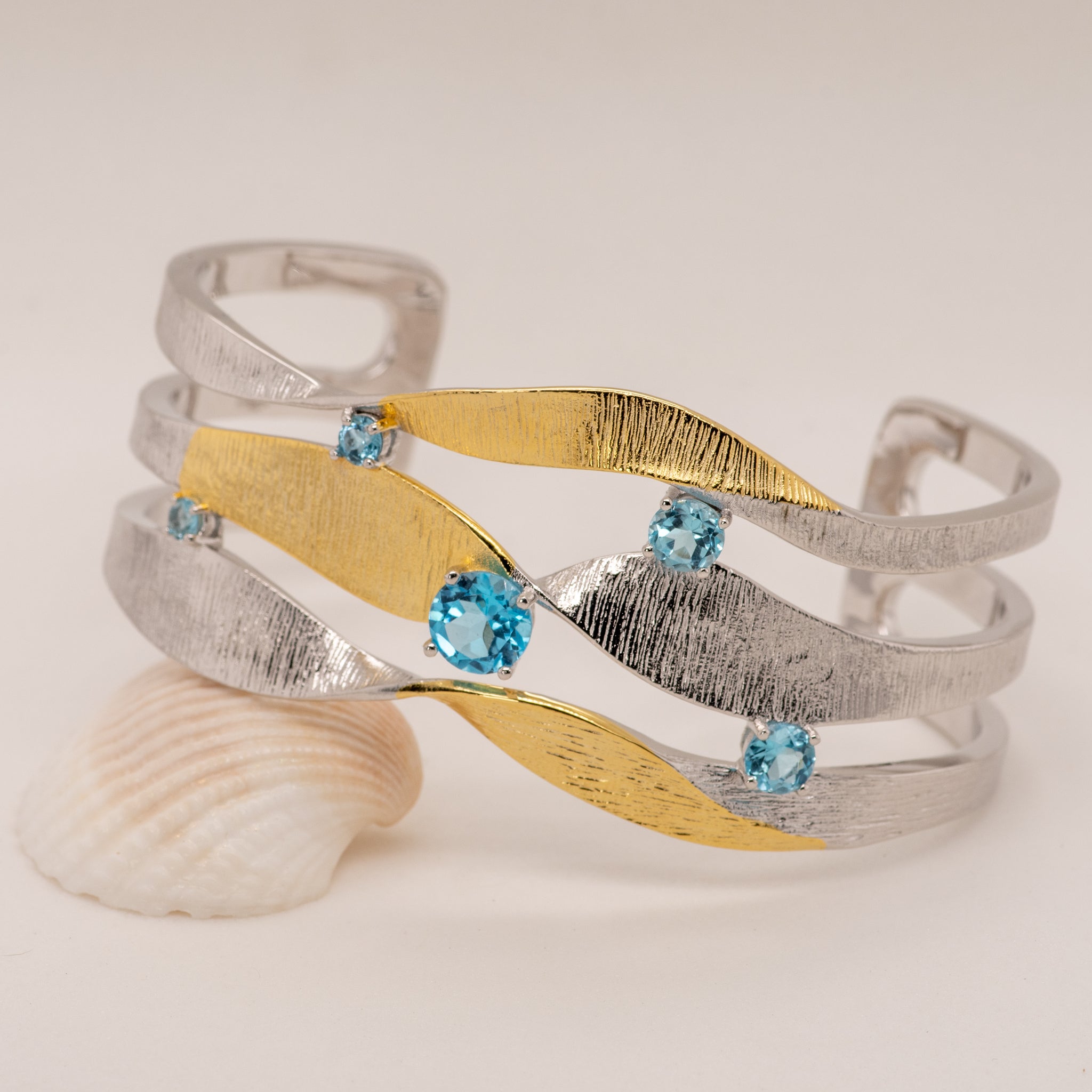 Swirl Blue Topaz Bracelet in Sterling Silver - Heron and Swan