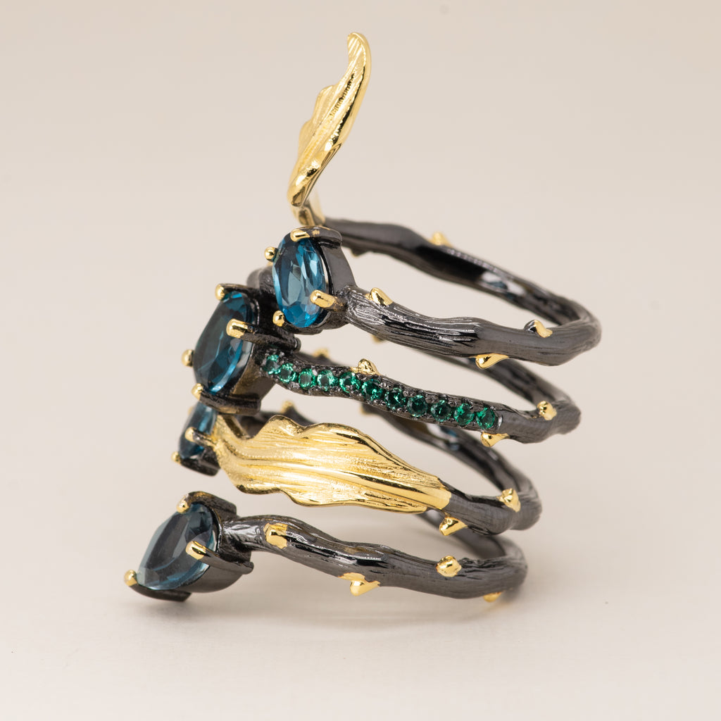 Daffodil London Blue Topaz Ring in Sterling Silver - Heron and Swan